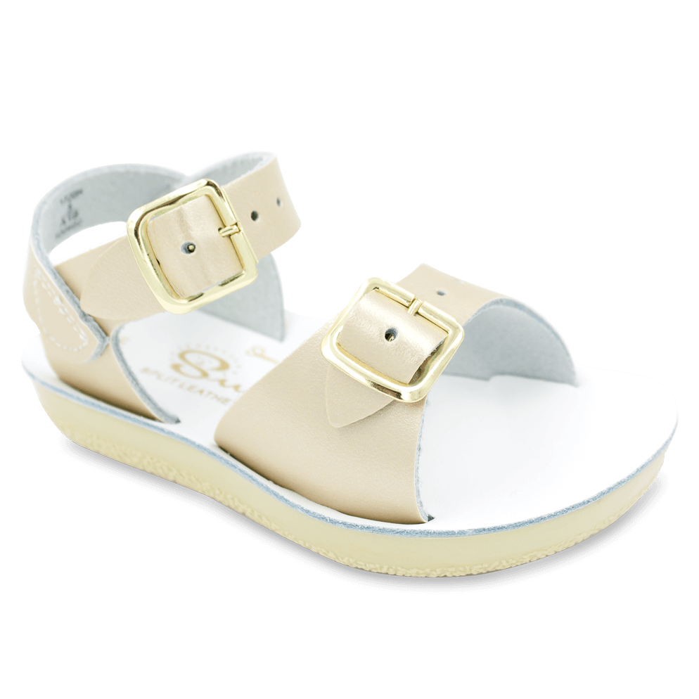The Sun-San® Surfer is a classic two-strap sandal that’s perfect for younger feet. With an adjustable toe buckle and ankle strap, they are great for both wide and narrow feet. The lightweight, cushioned urethane sole make these comfortable to wear all day long. Rust-proof brass buckles and scuff-resistant, water friendly genuine leather make them ideal for in-and-out of water wear. They clean up so easily, and with proper care will last for years.