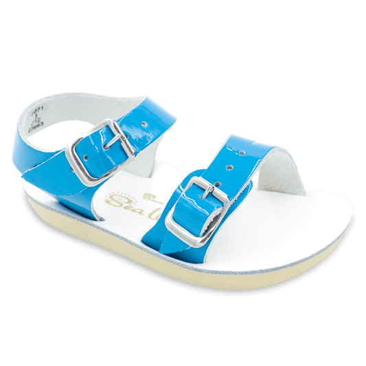 The Sun San® Sea Wee is made only in the smallest baby sizes. We have added flex over the toe making this little sandal a perfect starter pair for your tiny adventurer. A lightweight, cushioned urethane sole, rust-proof brass buckles, and scuff-resistant water friendly genuine leather make these sandals ideal for in-and-out of water wear. The Sea Wee is one of our best-selling baby sandals. Both boys and girls can wear these with anything and look great.