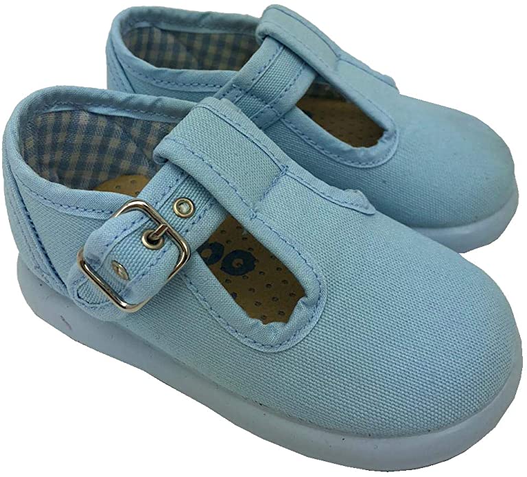 Canvas -Lightweight and comfy T strap in baby blue canvas upper - Buckle strap -Textile lining and padded insole. - Smooth traction rubber sole -Rounded toe -Made in Spain