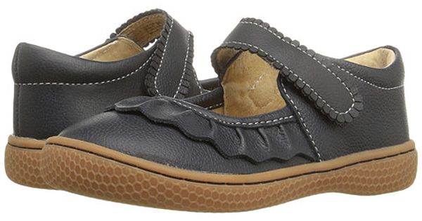 If we could only bottle the essence of Ruche... Would it be the ruffles? The scallops, the all-together dainty delightfulness? Whatever it is, she’s the perennially popular playground-to-party shoe. Crafted in soft heritage-quality leathers, she’s kid-tested and approved by the APMA (American Podiatric Medical Association), sure to withstand heavy play and support healthy foot development.
