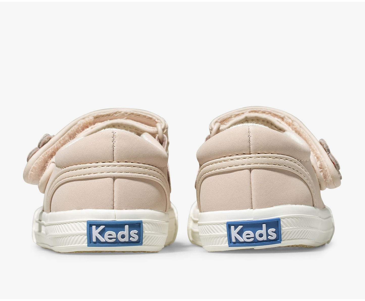 From playground to party time, Keds’ Ella is a not-so-plain Mary Jane. Featuring a sweet flower detail on the convenient hook & loop closure, plus a memory foam footbed and deep flex grooves making them as comfy as a sneaker, but perfect for parties!