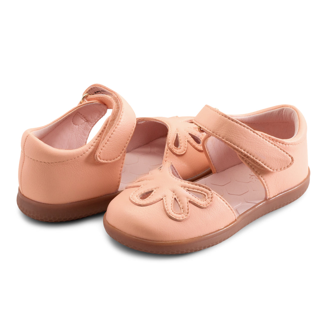 Petal 2.0 Dew Drop is cute as a button AND one high-performing sandal! She’s not only been engineered with high abrasion resistance vegan leather, but she also has absorbent quick dry linings, is machine washable, and has a molded EVA footbed for pure comfort. With a secret message on the strap, this vegan summer sandal for girls will make you smile and keep your kiddo safe at play.