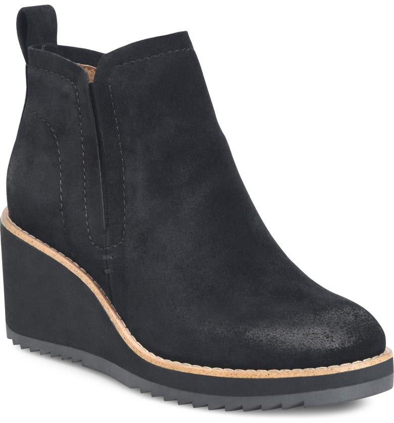 This modern Chelsea boot gets a boost of height from a sleek wedge with a non-slip sole, and its all-weather leathers will help keep you dry and comfortable. Offered in stain-resistant, waterproof suede and leather Seam-sealed construction AQUA Söfft collection Stretch goring Heel tab Microfiber lining Leather-lined footbed, cushioned for comfort with arch support Wedge with sawtooth detail and two-tone welt Lightweight non-slip TPR outsole for excellent traction in wet conditions Heel height: 2 3/4 inches