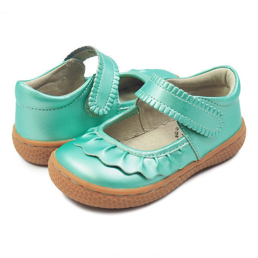 If we could only bottle the essence of Ruche... Would it be the ruffles? The scallops, the all-together dainty delightfulness? Whatever it is, she’s the perennially popular playground-to-party shoe.  Crafted in soft heritage-quality leathers, she’s kid-tested and approved by the APMA (American Podiatric Medical Association), sure to withstand heavy play and support healthy foot development.