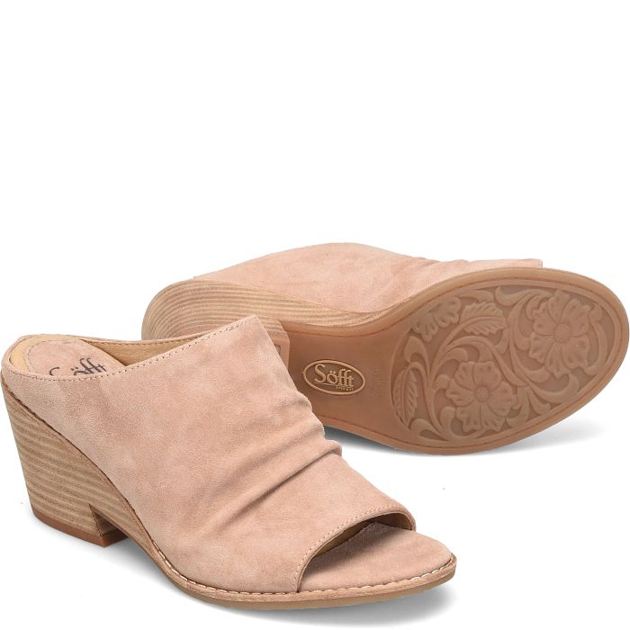 Luxe Italian leathers make this modern ruched slide irresistible. The Strathmore’s unique wedge-inspired silhouette gives it a one-of-a-kind look. Details Offered in Italian leathers and Italian suedes Microfiber lining Leather-lined footbed, cushioned at ball, heel and arch for extra support Lightweight TPR outsole Stacked cut-out wedge heel Heel Height: 3 inches