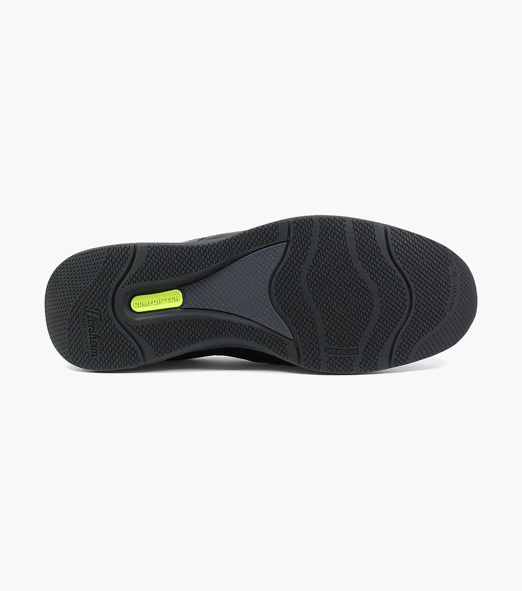 The Great Lakes region of the U.S. is known for its uncommon beauty. Our Great Lakes collection captures that spirit with stylish shoes that share a casual appeal, modern silhouette, on-trend soles, and the latest in barefoot comfort technology. The Florsheim Great Lakes Moc Toe Slip On features a venetian-style vamp and the added comfort of a dual gore enclosure.