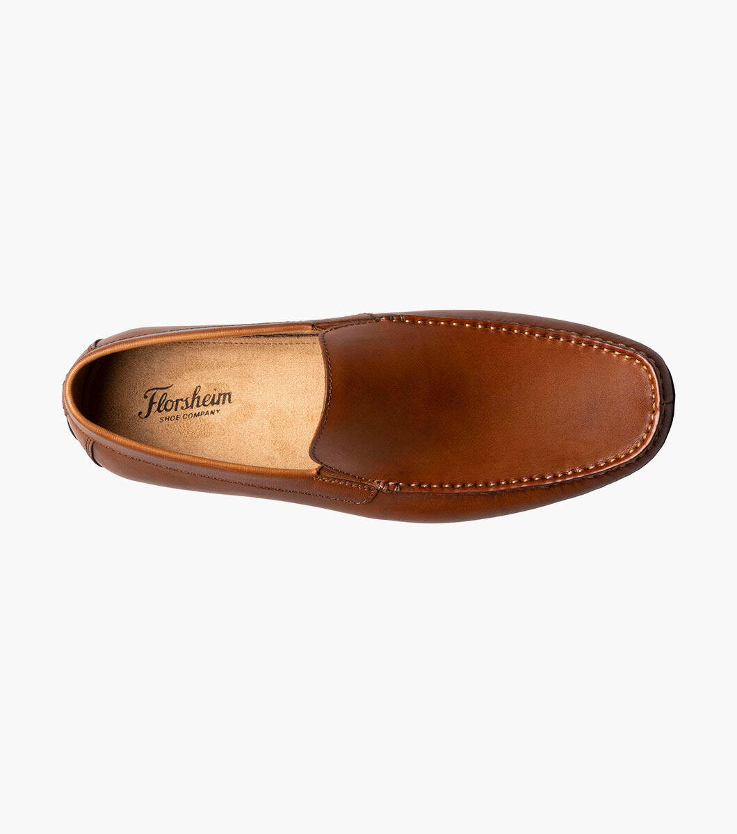 Get into the fashion fast lane with the Florsheim Talladega Moc Toe Venetian Driver. Made of beautiful materials on the upper, it also features the comfort of a fully cushioned footbed and soft Suedetec linings.