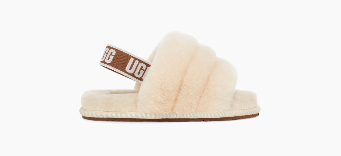 Fluff Yeah is as good as it sounds, combining a slipper and sandal into one adorable statement shoe. Soft sheepskin wraps the foot to keep your little one warm and cozy, while a rubber sole ensures they won't slip as they take their first steps. Pair with leggings or dresses for playdates and parties. This is a tiny version of our Women's style – perfect for mini-me moments and photo ops.
