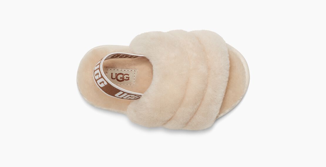 Fluff Yeah is as good as it sounds, combining a slipper and sandal into one adorable statement shoe. Soft sheepskin wraps the foot to keep your little one warm and cozy, while a rubber sole ensures they won't slip as they take their first steps. Pair with leggings or dresses for playdates and parties. This is a tiny version of our Women's style – perfect for mini-me moments and photo ops.