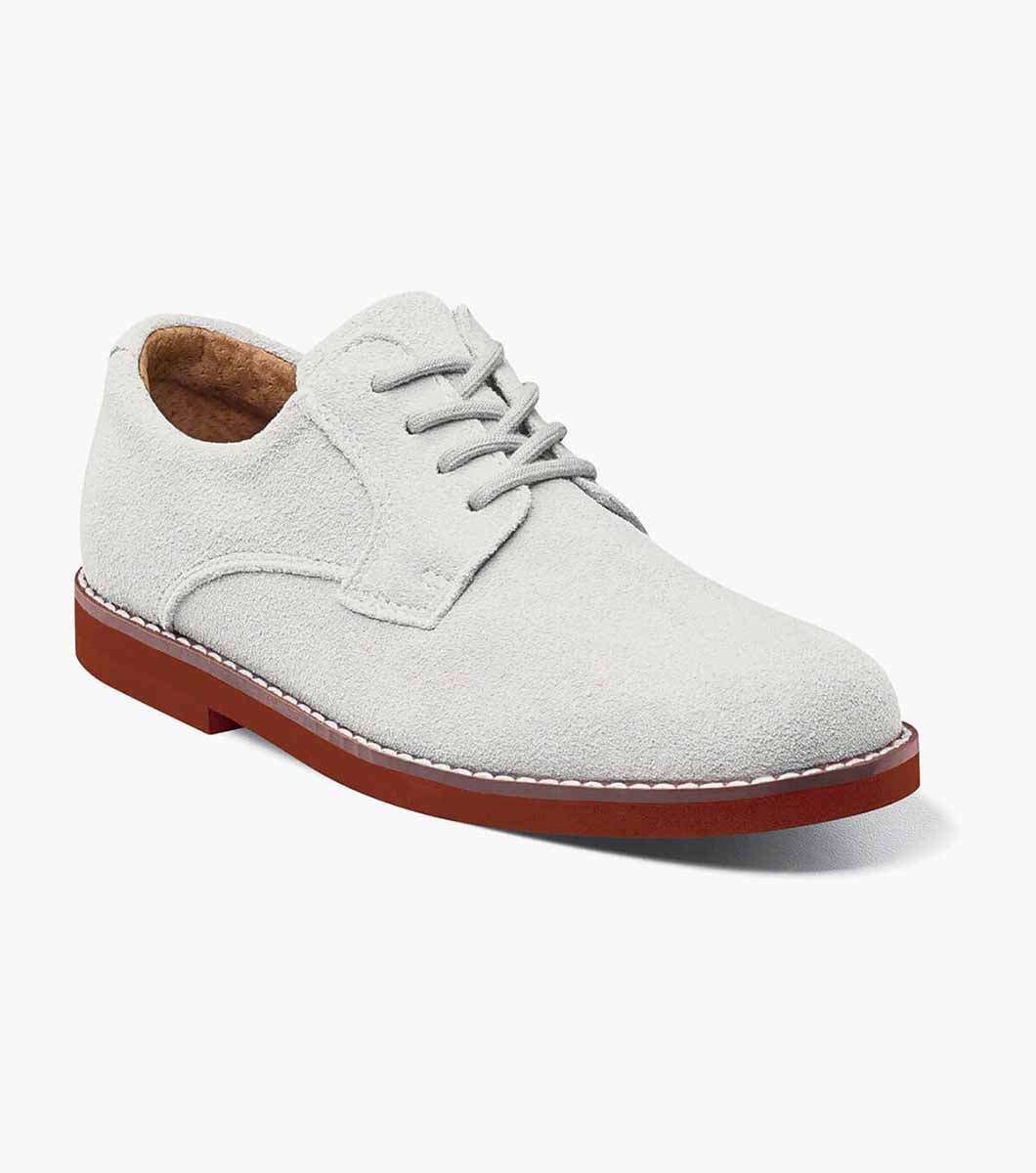 Made for school or play, the Florsheim Kearny Plain Toe Oxford, Jr. is tough enough for any after school activity. This dress casual suede oxford also features a hip contrast outsole and classic laces.  Soft suede upper Breathable, moisture-wicking Suedetec linings Fully cushioned footbed for all-day comfort Lightweight and durable EVA sole