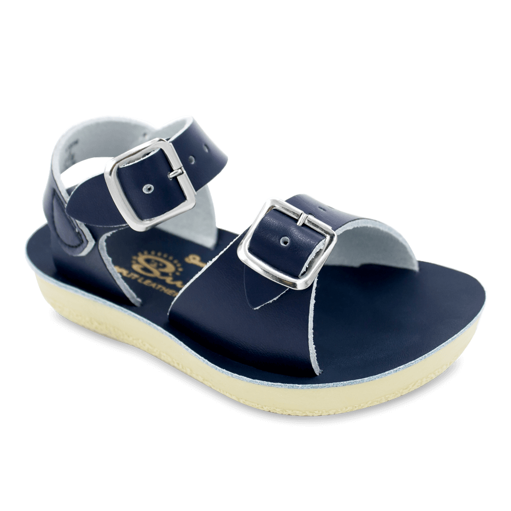 The Sun-San® Surfer is a classic two-strap sandal that’s perfect for younger feet. With an adjustable toe buckle and ankle strap, they are great for both wide and narrow feet. The lightweight, cushioned urethane sole make these comfortable to wear all day long. Rust-proof brass buckles and scuff-resistant, water friendly genuine leather make them ideal for in-and-out of water wear. They clean up so easily, and with proper care will last for years.