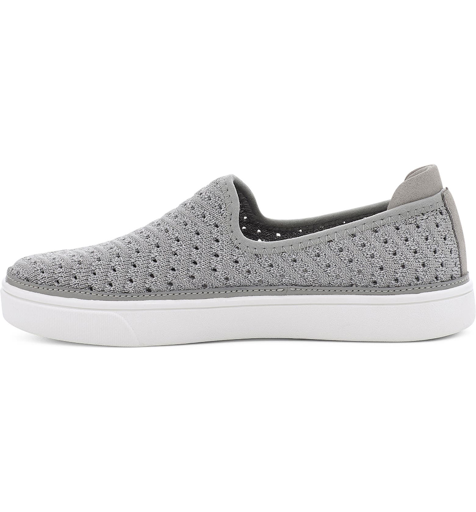 A breathable knit upper flecked with metallic shimmer defines an easy-going slip-on sneaker furnished with a cushioned footbed for play-all-day comfort. An antimicrobial lining made from recycled materials adds an eco-friendly touch while helping to keep little feet fresh.