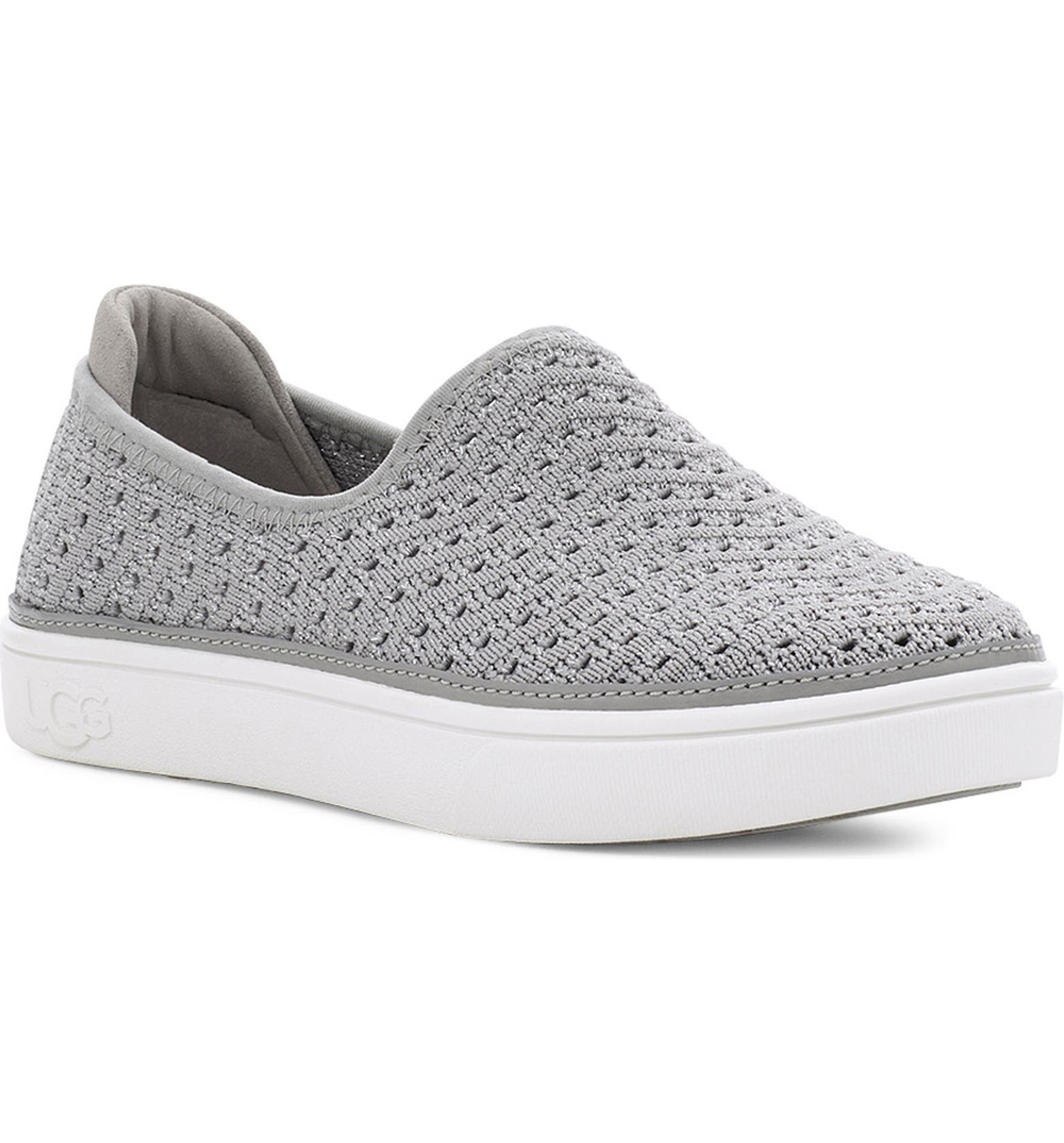 A breathable knit upper flecked with metallic shimmer defines an easy-going slip-on sneaker furnished with a cushioned footbed for play-all-day comfort. An antimicrobial lining made from recycled materials adds an eco-friendly touch while helping to keep little feet fresh.