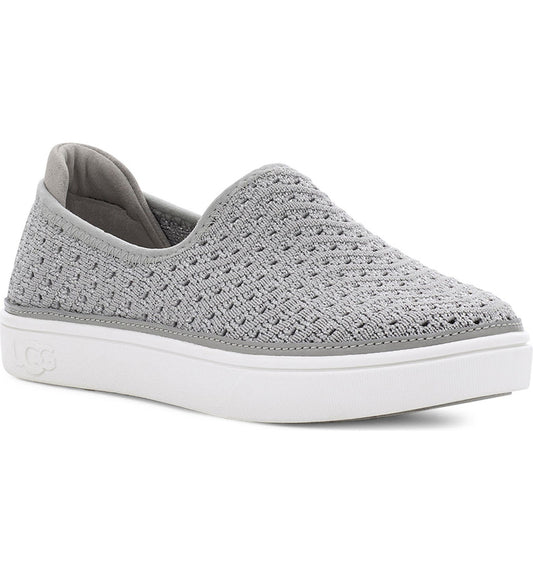 A breathable knit upper flecked with metallic shimmer defines an easy-going slip-on sneaker furnished with a cushioned footbed for play-all-day comfort. An antimicrobial lining made from recycled materials adds an eco-friendly touch while helping to keep little feet fresh.