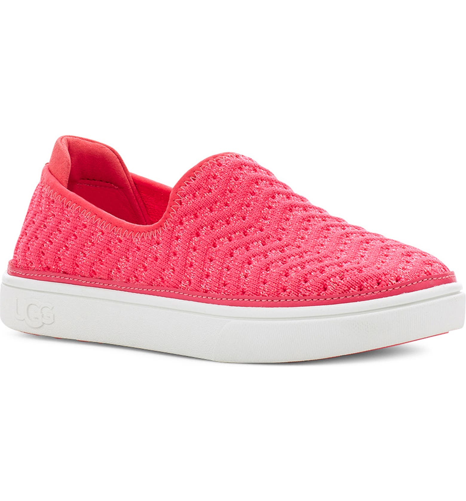 A breathable knit upper flecked with metallic shimmer defines an easy-going slip-on sneaker furnished with a cushioned footbed for play-all-day comfort. An antimicrobial lining made from recycled materials adds an eco-friendly touch while helping to keep little feet fresh.