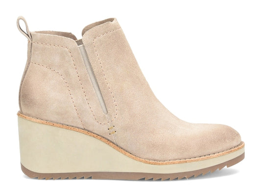 This modern Chelsea boot gets a boost of height from a sleek wedge with a non-slip sole, and its all-weather leathers will help keep you dry and comfortable.  Offered in stain-resistant, waterproof suede and leather Seam-sealed construction AQUA Söfft collection Stretch goring Heel tab Microfiber lining Leather-lined footbed, cushioned for comfort with arch support Wedge with sawtooth detail and two-tone welt Lightweight non-slip TPR outsole for excellent traction in wet conditions Heel height: 2 3/4 inches