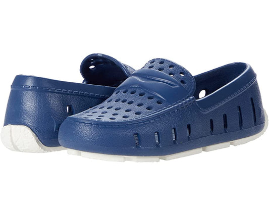Lightweight and water friendly, the Floafers Prodigy Driver is the perfect every day shoe for the warm weather. Slip-on driver style loafers made from EVA foam. Advanced 360 degree ventilation that keeps feet cool and helps water and debris drain away quickly. Massage-pod foot bed with enhanced arch support. Water-friendly, buoyant, and easy to clean. Scuff-proof thermoplastic rubber outsole. Imported.