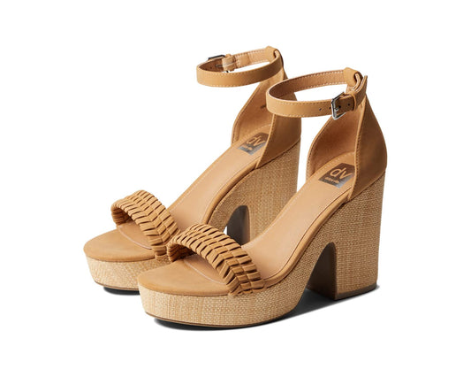 Keep it classy and comfortable wearing DV by Dolce Vita® Coda heels. Man-made upper. Man-made lining and insole. Slip-on construction with ankle buckle strap. Block heel design. Designer over-the-toe strap. Man-made sole. Imported. Measurements: Heel height: 5 in.