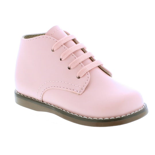 Custom Fit System – Removable, dual insoles in Medium and Wide provided for customized fitting. Roomy Toe Box – Allows tiny toes room to breathe and splay naturally during walking, enhancing balance and reducing rubbing, friction, and moisture. Arch Support – Shoe last and insole designed to provide proper arch support for developing feet. High-quarter design provides maximum support and stability for first-walkers.