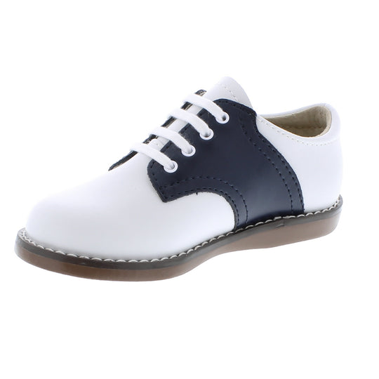 Custom Fit System – Removable, dual insoles in Medium and Wide provided for customized fitting. Roomy Toe Box – Allows tiny toes room to breathe and splay naturally during walking, enhancing balance and reducing rubbing, friction, and moisture. Arch Support – Shoe last and insole designed to provide proper arch support for developing feet. Firm Heel Counter – Provides stable lateral support for new and confident walkers alike, improving balance, support, and posture.