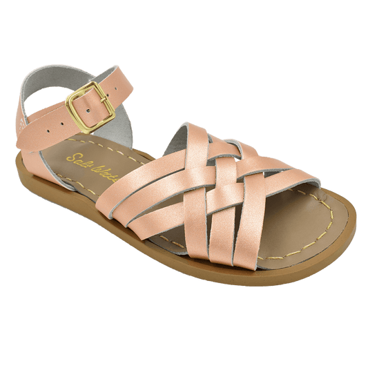 the Salt Water Retro, from the archives, rewinding the eight-track back to the Peaches & Herb era and the first wave of macramé. Now, these woven sandals are a fashion-forward statement for any wardrobe. They are ready to step out on the beach or dance floor without missing a beat.