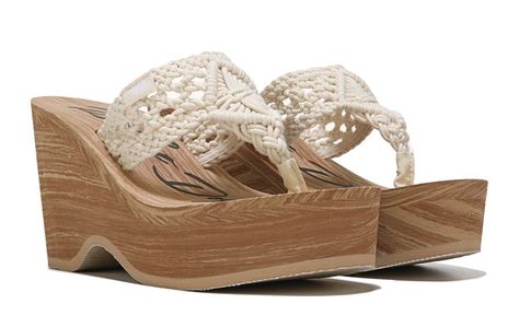 Finally Comfort Meets Style With This Rocket Dog Helena Wedge Slip on Sandal.  Featuring a Lightweight Demi Wedge Sole for Comfort With Crochet Upper and Toe Post.  Complimented by a Matching Stitched Rocket Dog  Logo and Rocket Dog Branding to The Footbed.  Ideal For Casual Daytime Beach Wear, Festivals or Complimenting Your Evening Wardrobe. Choose from Black With Black Wedge or Natural With Natural Wedge.