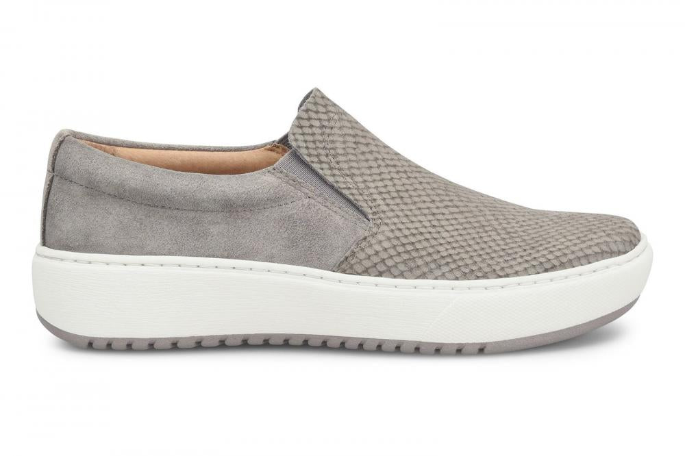 cool and casual Watney slip on is beyond comfortable, with buttery-soft nubuck leathers and plush cushioning.  Exotic texture gives it just the right pop of interest.  Details Offered in embossed nubuck with suede or nubuck accent Stretch goring Padded heel collar for added comfort Leather lining Leather-lined footbed, cushioned for extra comfort with arch support Lightweight EVA midsole with rubber outsole Heel height: 1 ½ inches