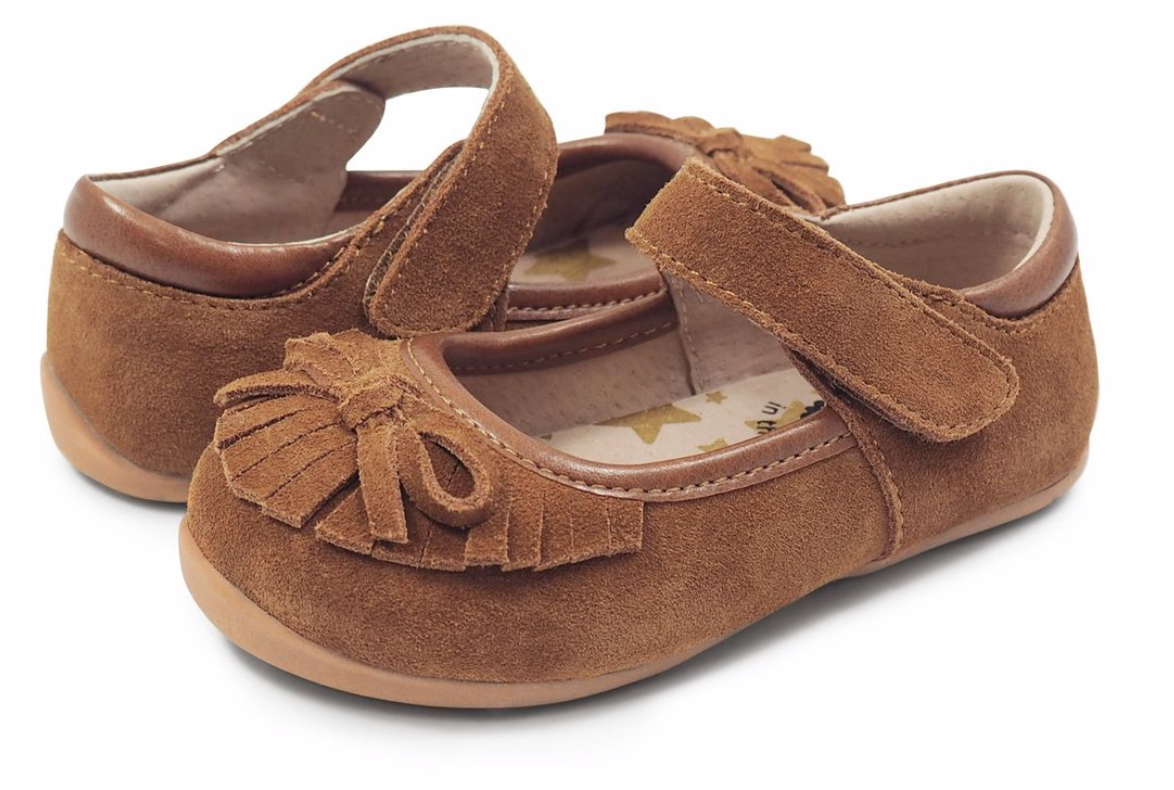 With A Delicate Fringe And Bow “Willow” Is Our Soft And Flexible Moccasin-Style Shoe For Girls! Her Traditional Camel And Butterscotch Suede Options Provide Versatility For Any Occasion.  Suede Upper Leather Lining With Gold Stars Synthetic Dancer Outsole Hook And Loop Closure For A Just-Right Fit Padded Collar For Comfort