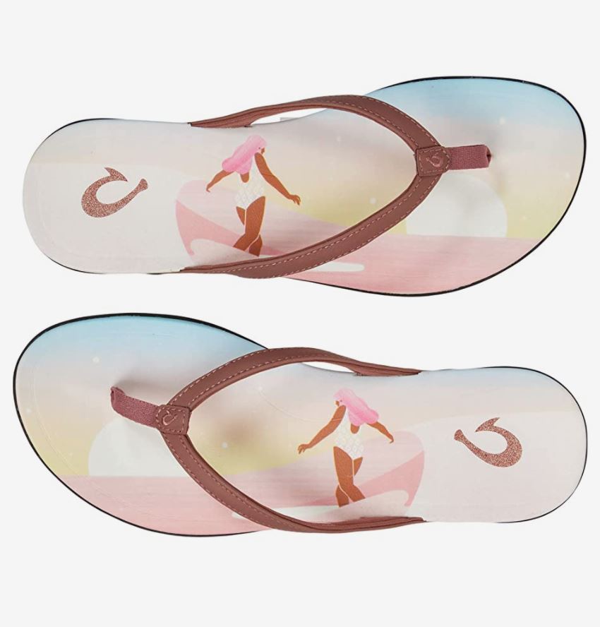 As a tribute to iconic waves in Hawai’i and the women who surf them, Olukai added custom “Surfer Girl” artwork to their Ho’Opio Pae. Designed to be slim, beautiful, and inspiring-this breezy beach sandal fills every step with island energy.