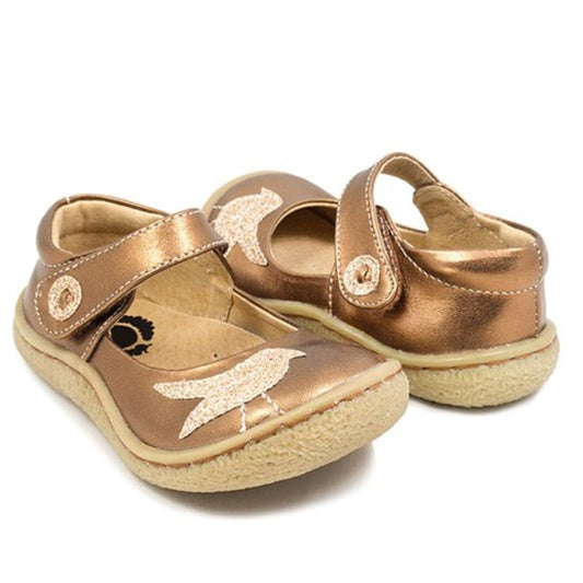 Pio! Pio! says the little bird in Spanish! Your little bird will chirp joyfully in these precious Mary Janes for girls – our sweetheart of a shoe.  Magenta leather exterior Gold glitter leather detailing Natural leather lining Easy velcro closure for a just-right fit Padded collar for comfort Length: True to size; Width: Wide