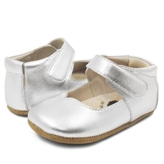 Whether paired with leggings or a dress, your little sweetheart will look great with these charming Mary Janes featuring soft suede soles boasting rubber grip pads for extra traction.  Hook and loop closure Leather upper Leather lining Rubber sole APMA-approved sole Padded elastic collar Imported